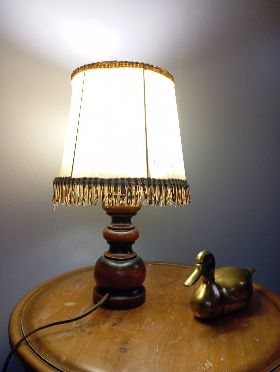 Rustic turned wood table lamp with vintage leather shade