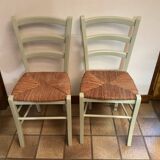 Pair of green straw chairs