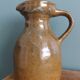 Rustic stoneware jug, chic countryside.