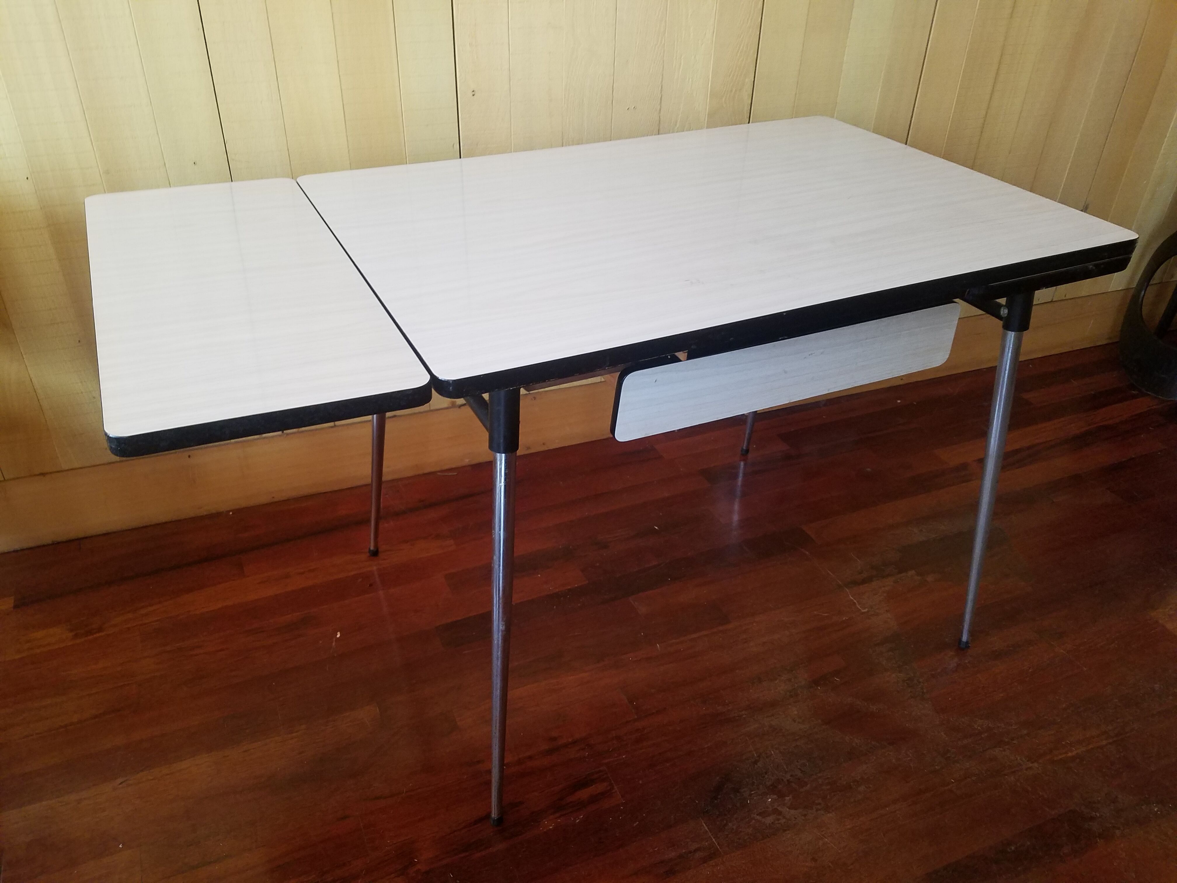 Old vintage 1965 white formica kitchen table