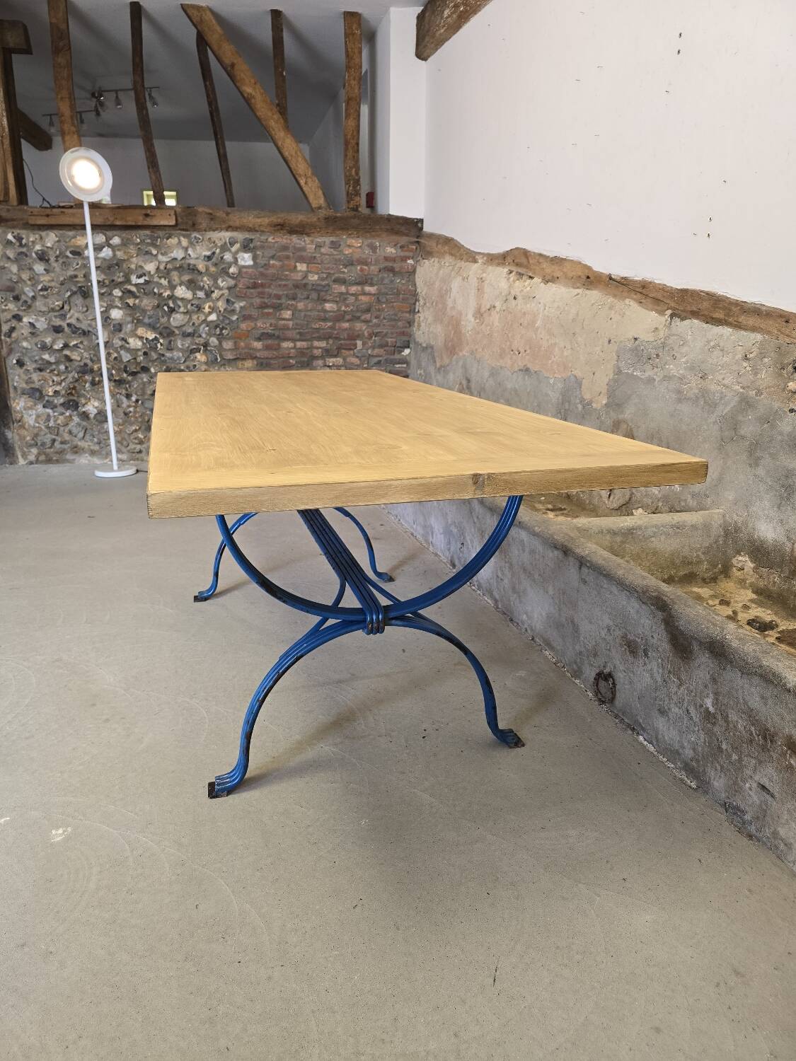 Wrought iron and solid wood table