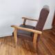 Paire de fauteuils moleskine marron