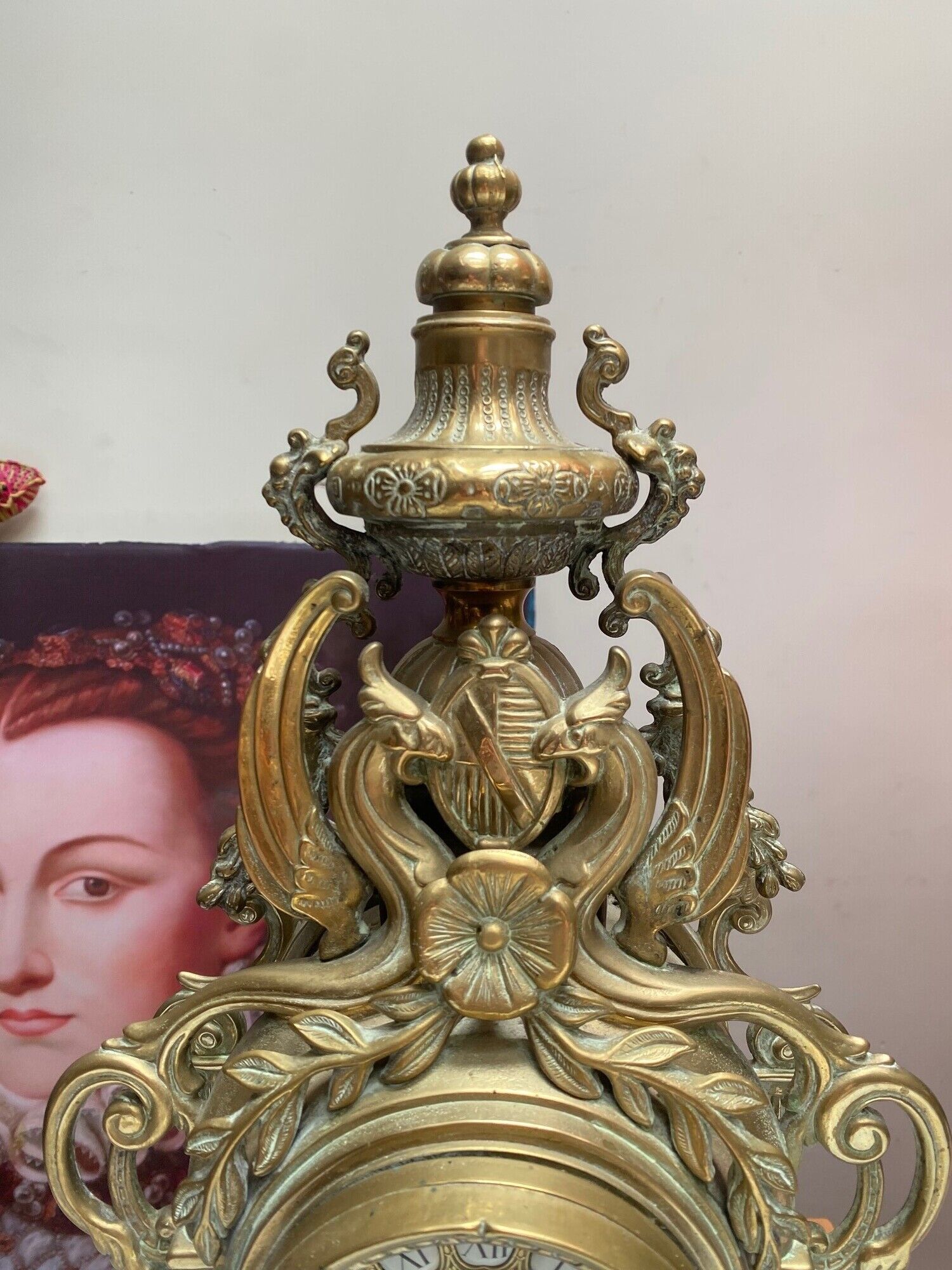 Fireplace trim clock and adornment of antique bronze candelabra