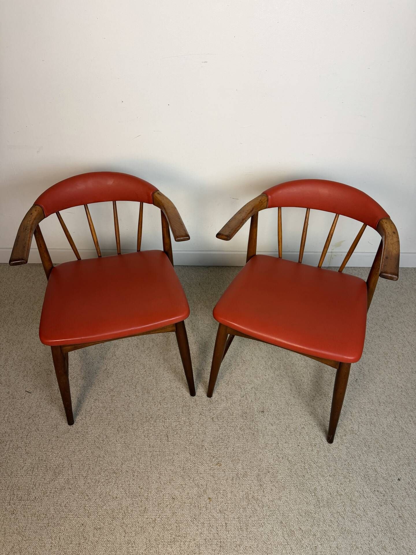 Pair of Scandinavian armchairs in teak and red faux leather – 1960s