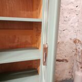 Small green glass cabinet