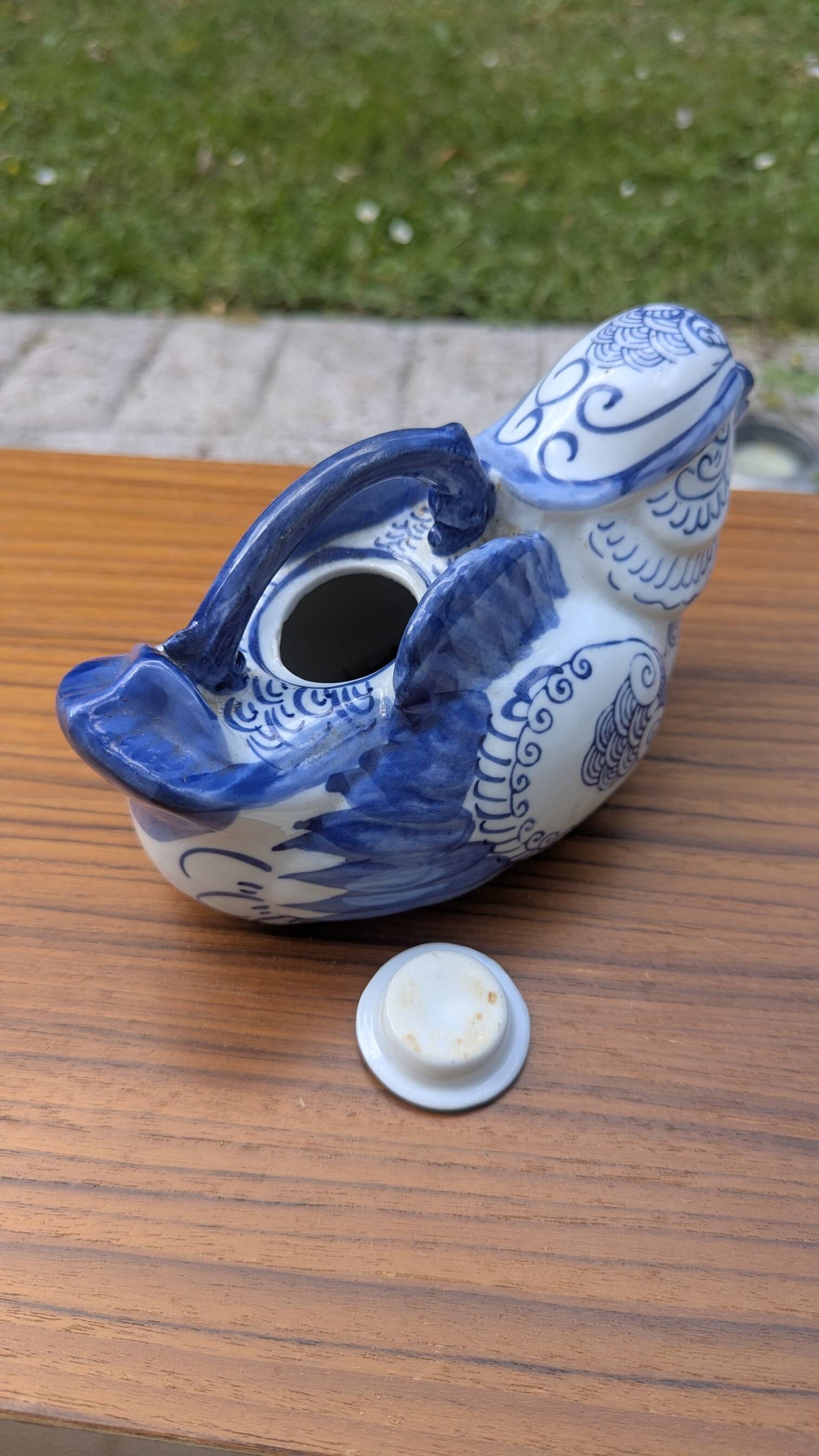 Old teapot / bird-shaped jug in blue and white porcelain