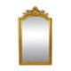 Large antique gilded wooden mirror in Louis XVI style with a sculpted pediment, 19th century.