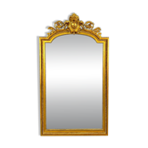 Large antique gilded wooden mirror in Louis XVI style with a sculpted pediment, 19th century.