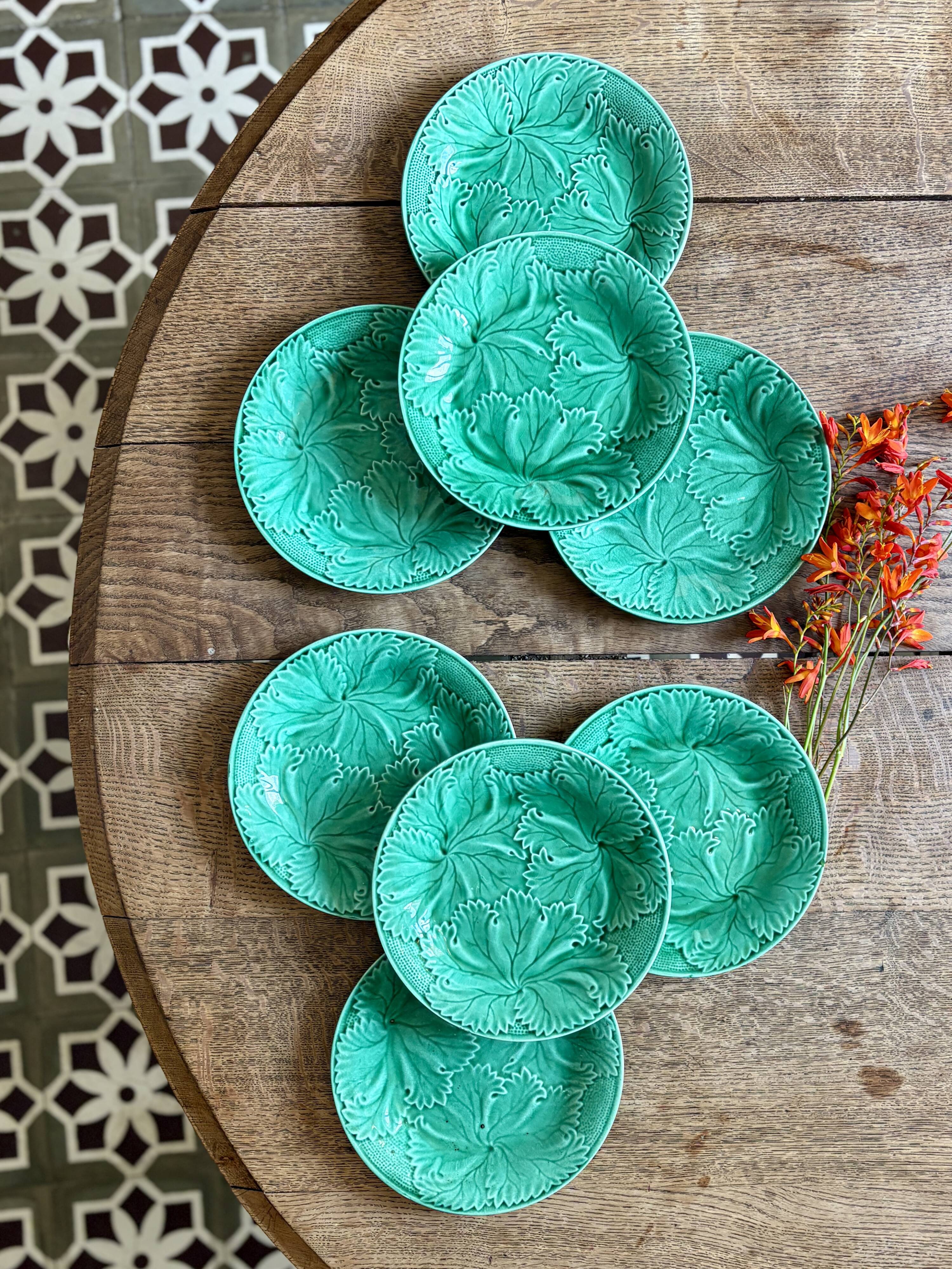 Set of 8 vintage green faience dessert plates, majolica.