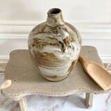 Set of three glazed ceramic pitchers