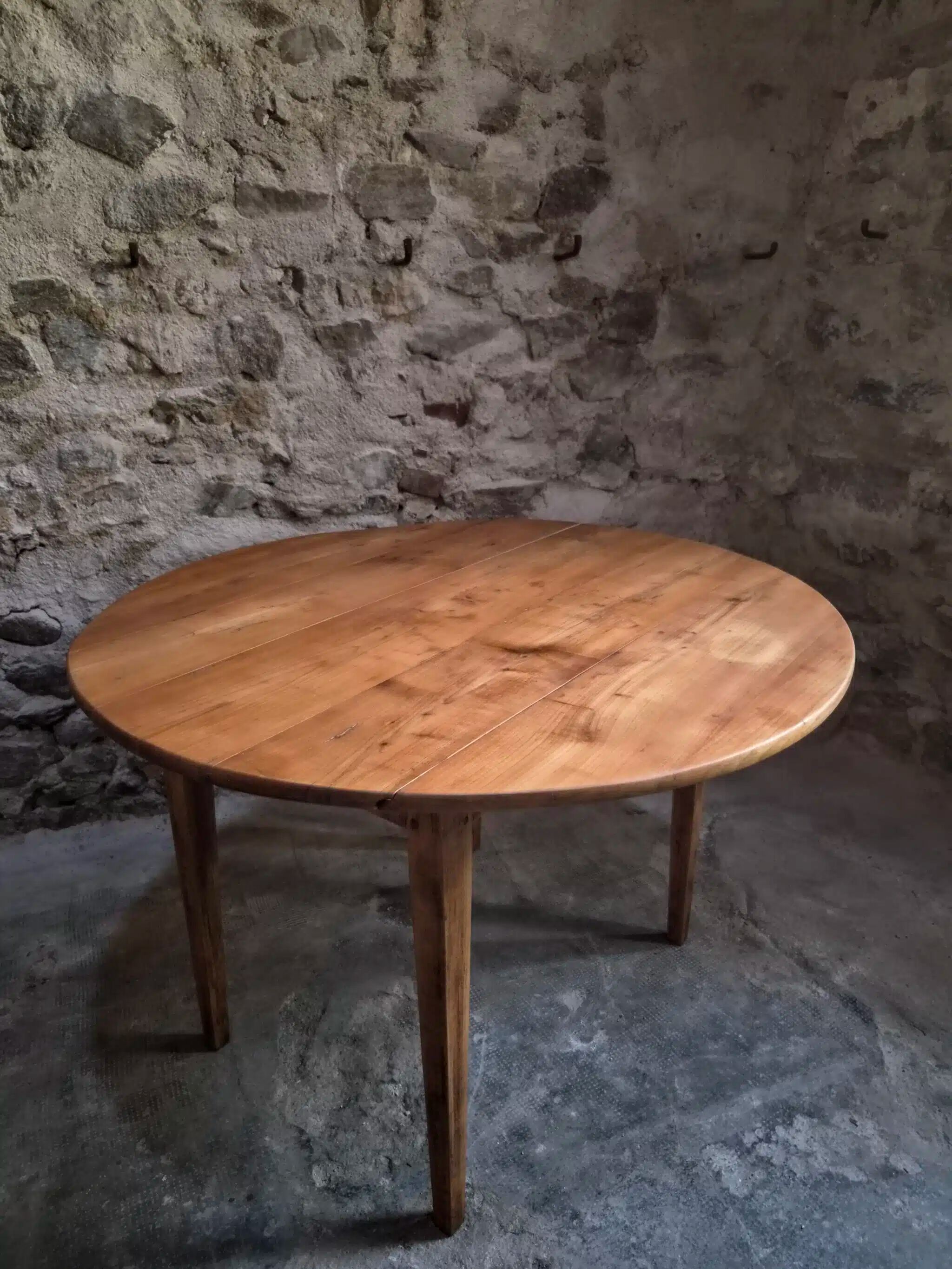 Rustic French antique dining table, drop-leaf table in cherry wood, circa 1900.