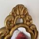 Golden mirror in baroque style.
