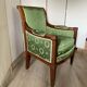 Fauteuil de style Empire en bois et tissu vert