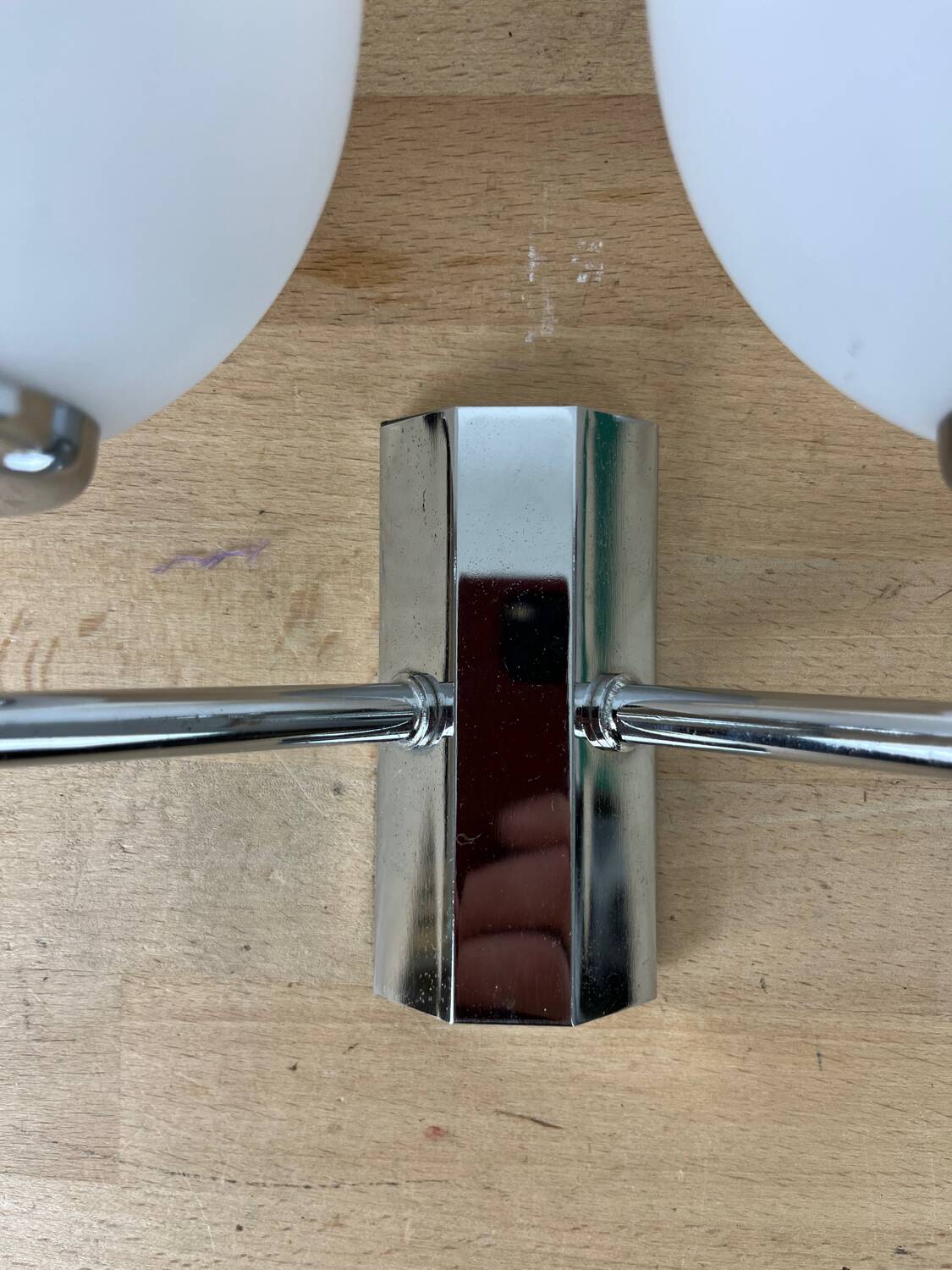 Opaline and chrome globe wall light from the 1970s