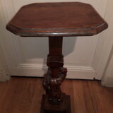 A side table carved from a gnome