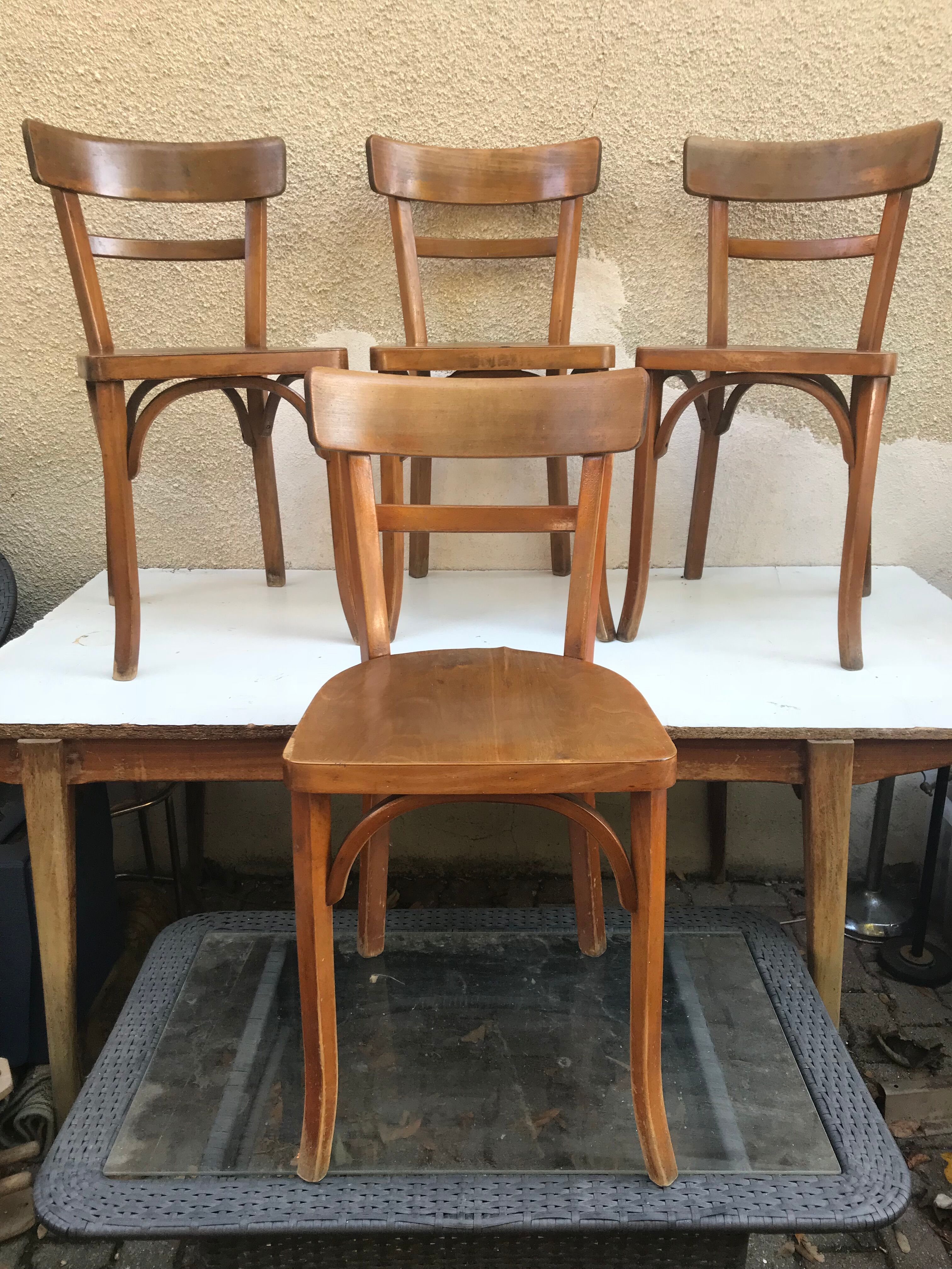 Serie de 4 chaises anciennes bistrot Baumann années 60