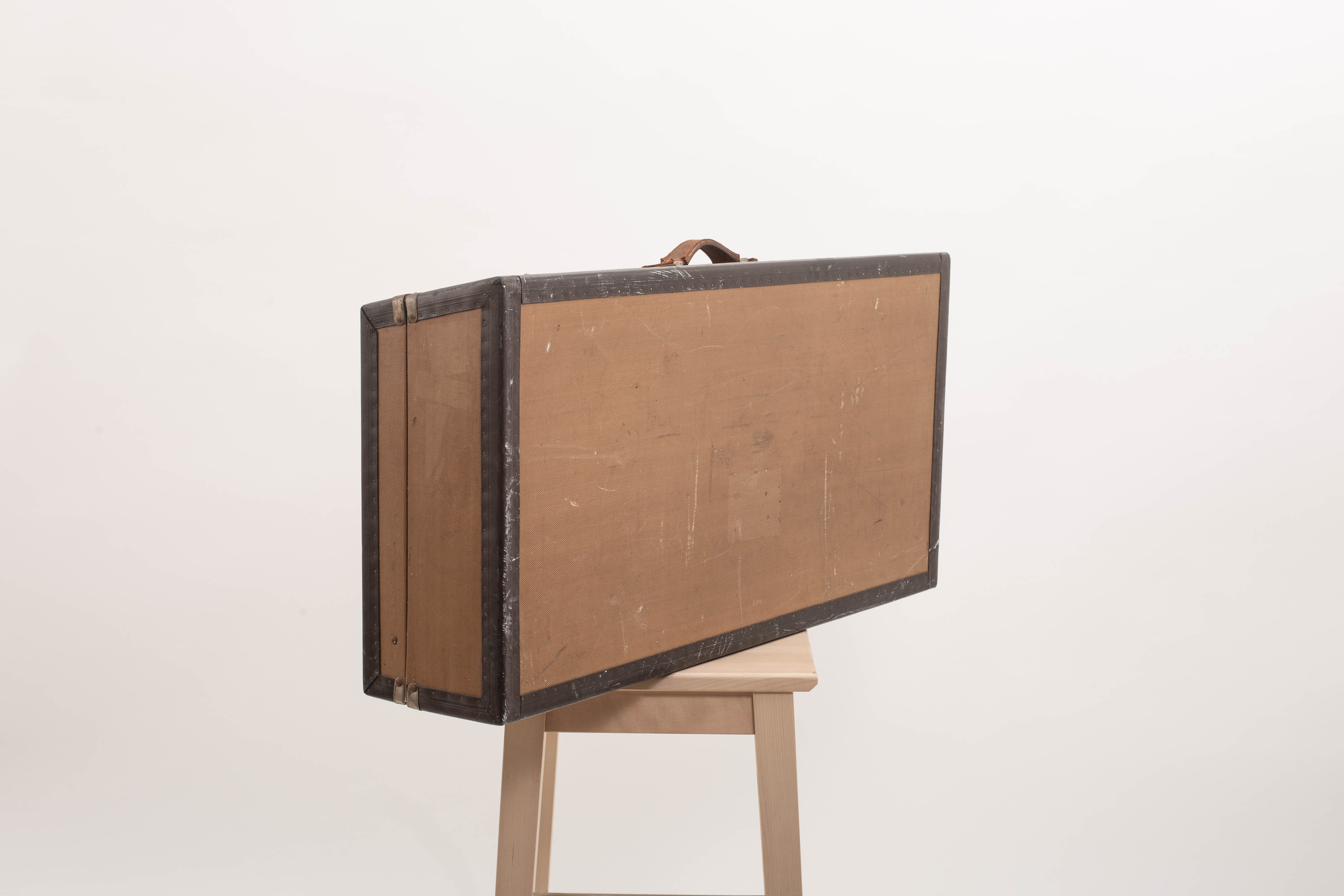 Pair of old rigid suitcases for cars
