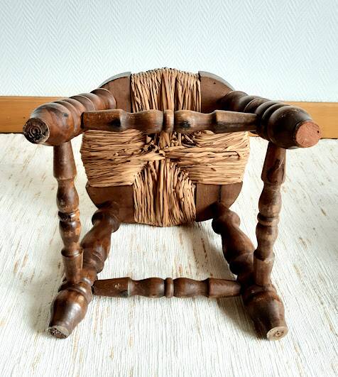 Pair of wood and straw fireplace stools, 1950s