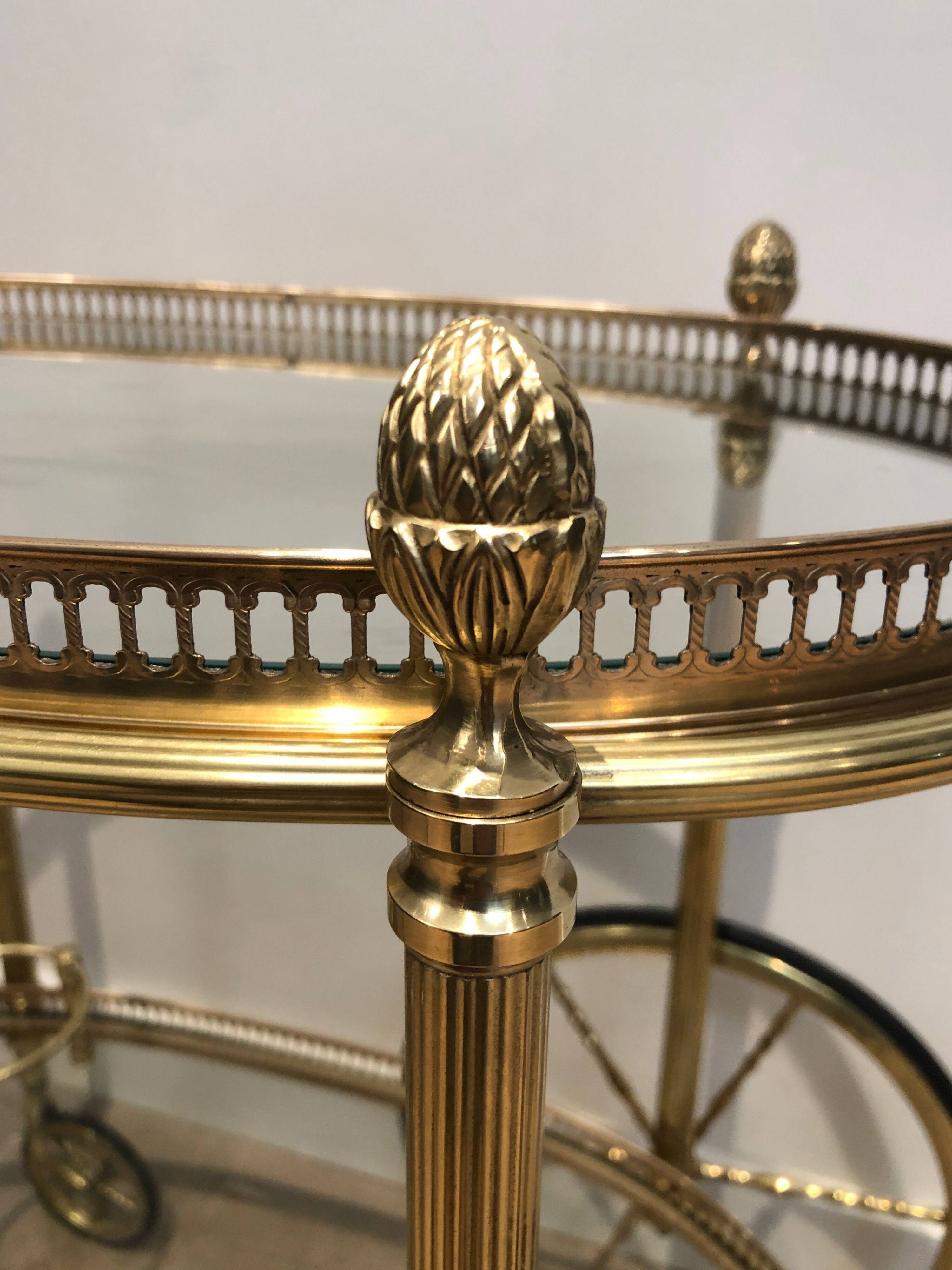 Oval brass trolley from Maison Baguès.