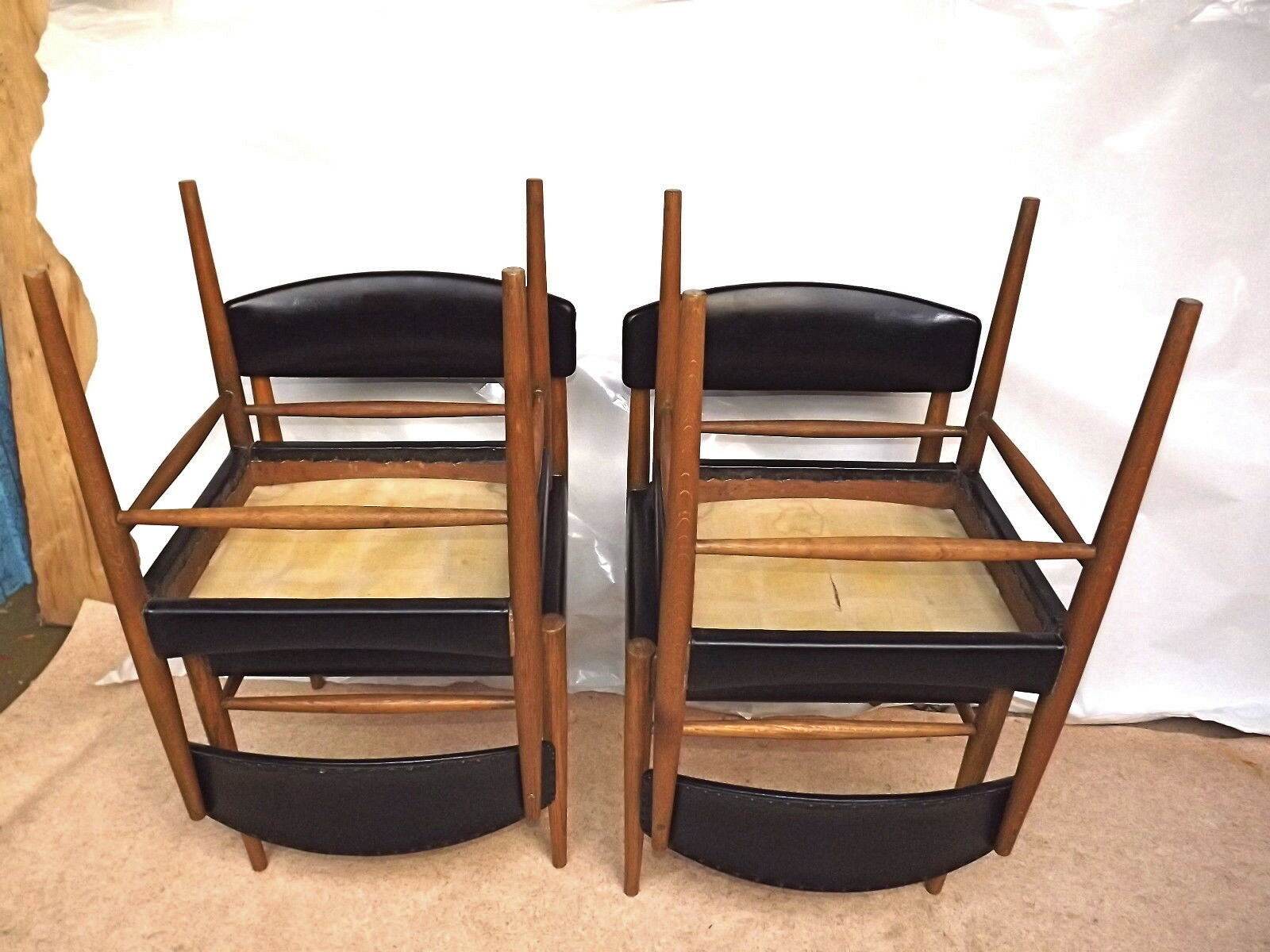 Four Scandinavian-style chairs