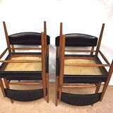 Four Scandinavian-style chairs