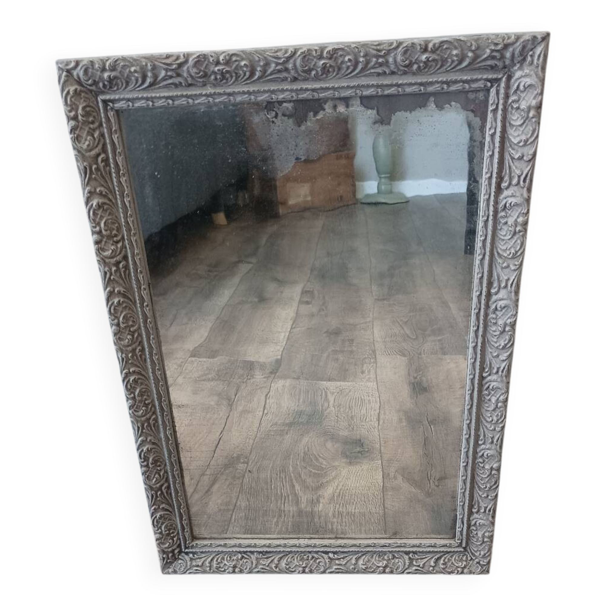 Antique mirror in carved, painted and patinated wood