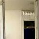 Louis XVI style mirror in wood and carved stucco 20th century