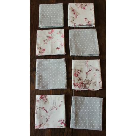 A set of 8 gray blue napkins with pink flowers and polka dots