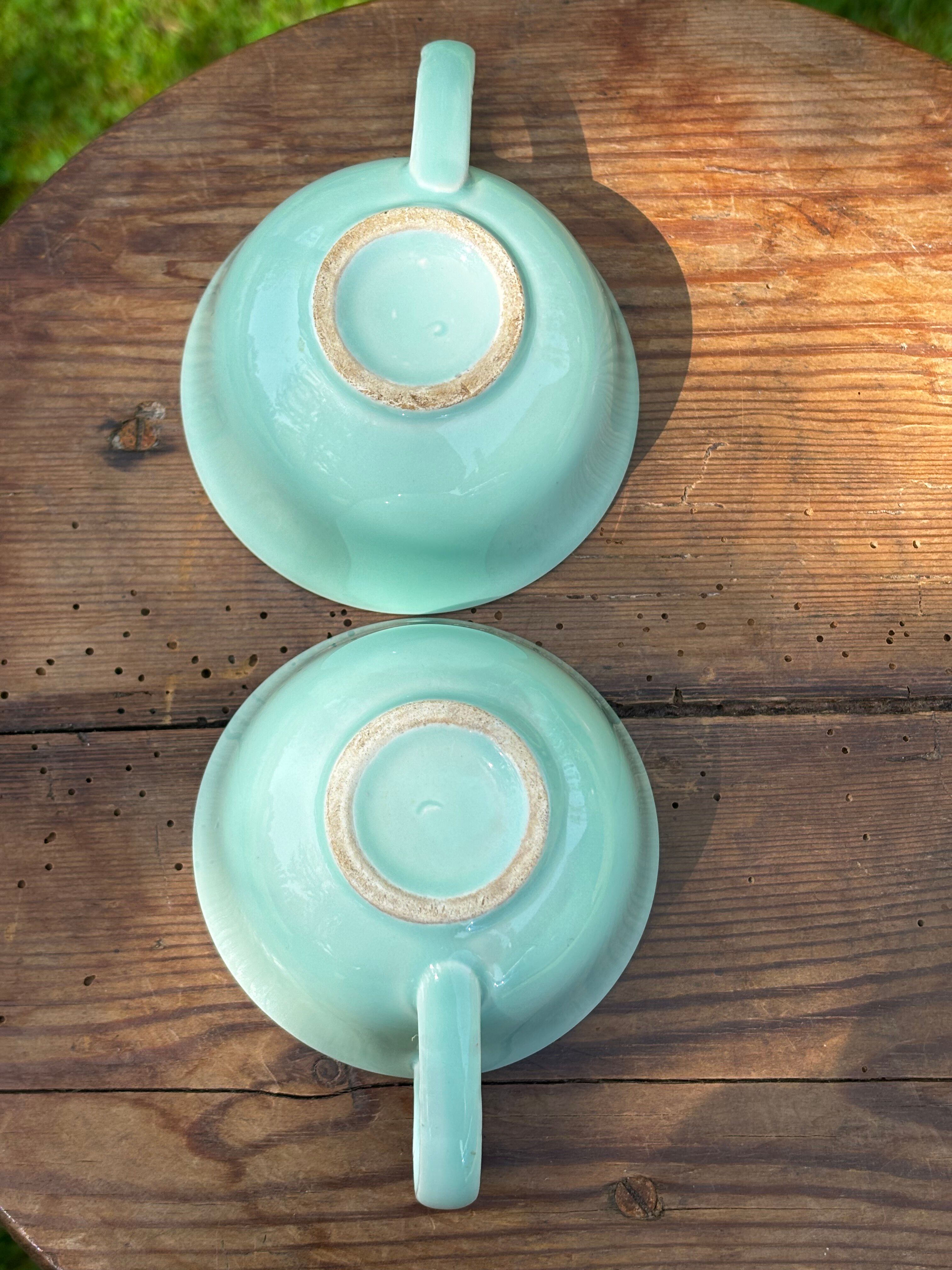 Set of 5 mismatched vintage pastel-coloured cups.