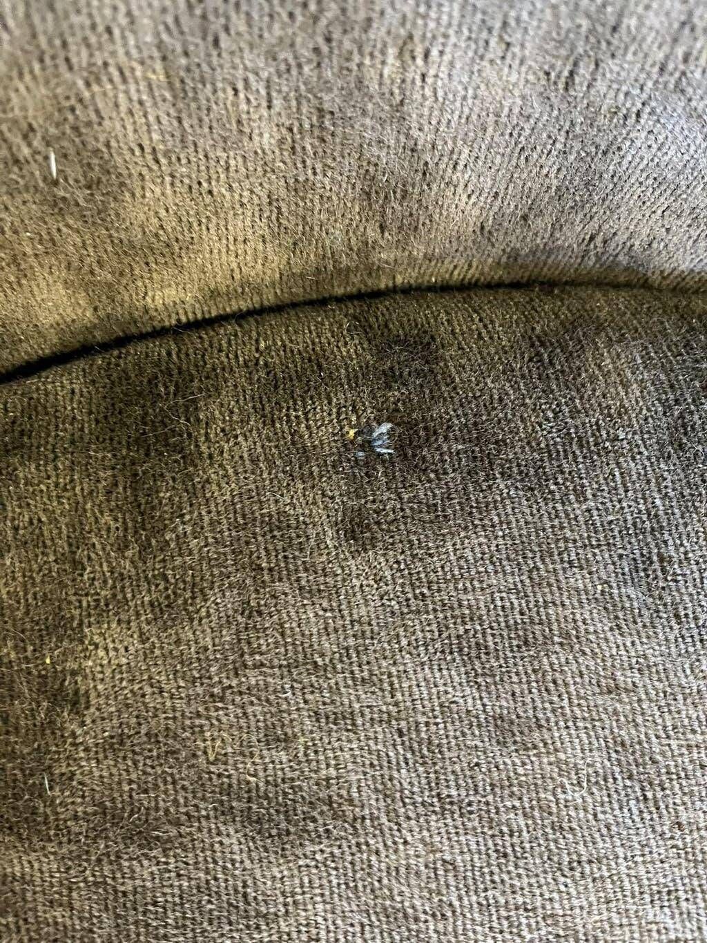 Brown vintage armchair/chair on a star base.