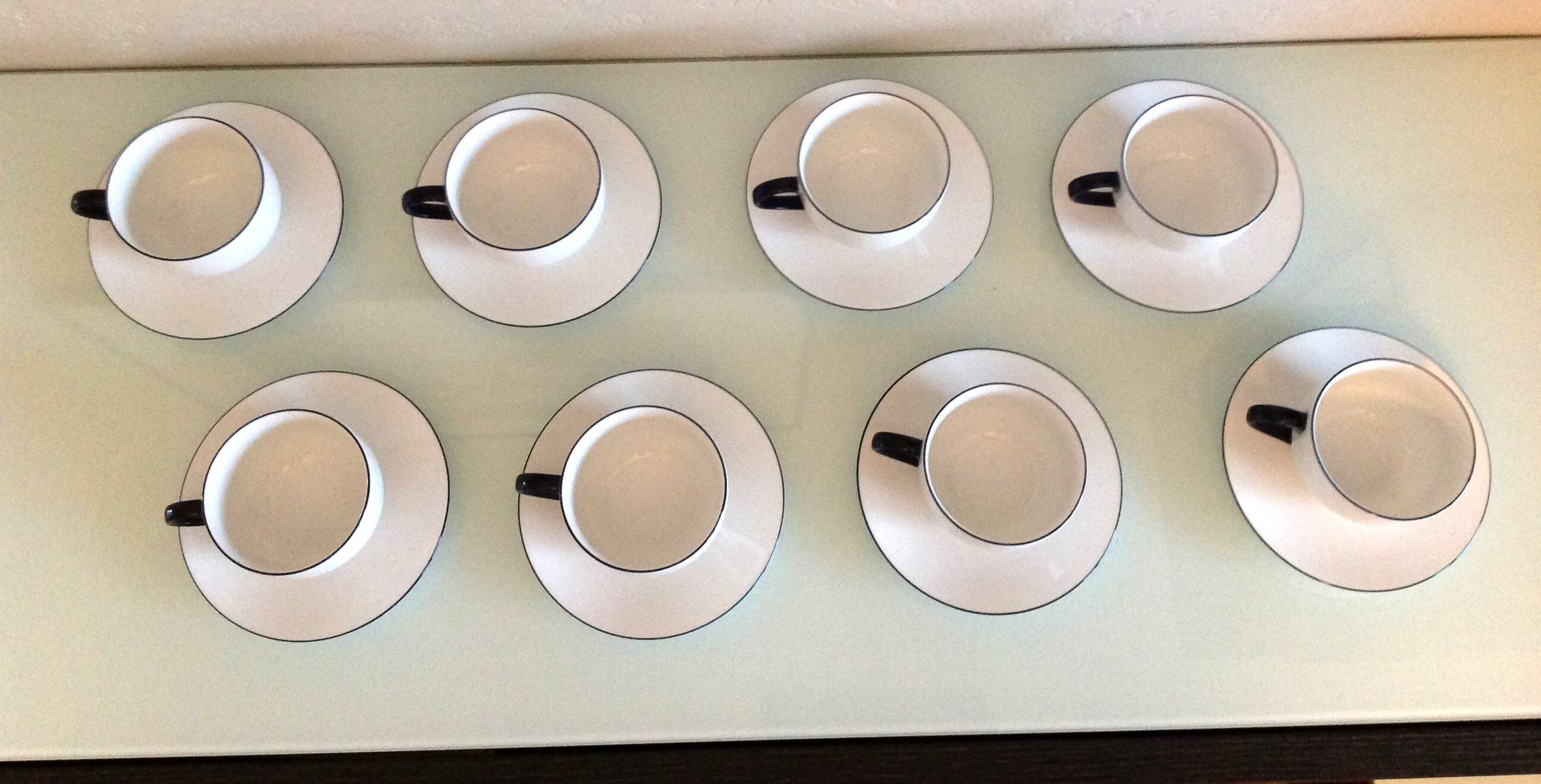 Set of eight white porcelain cups with blue edging / vintage 70s-80s