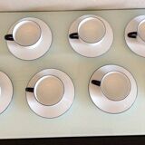 Set of eight white porcelain cups with blue edging / vintage 70s-80s
