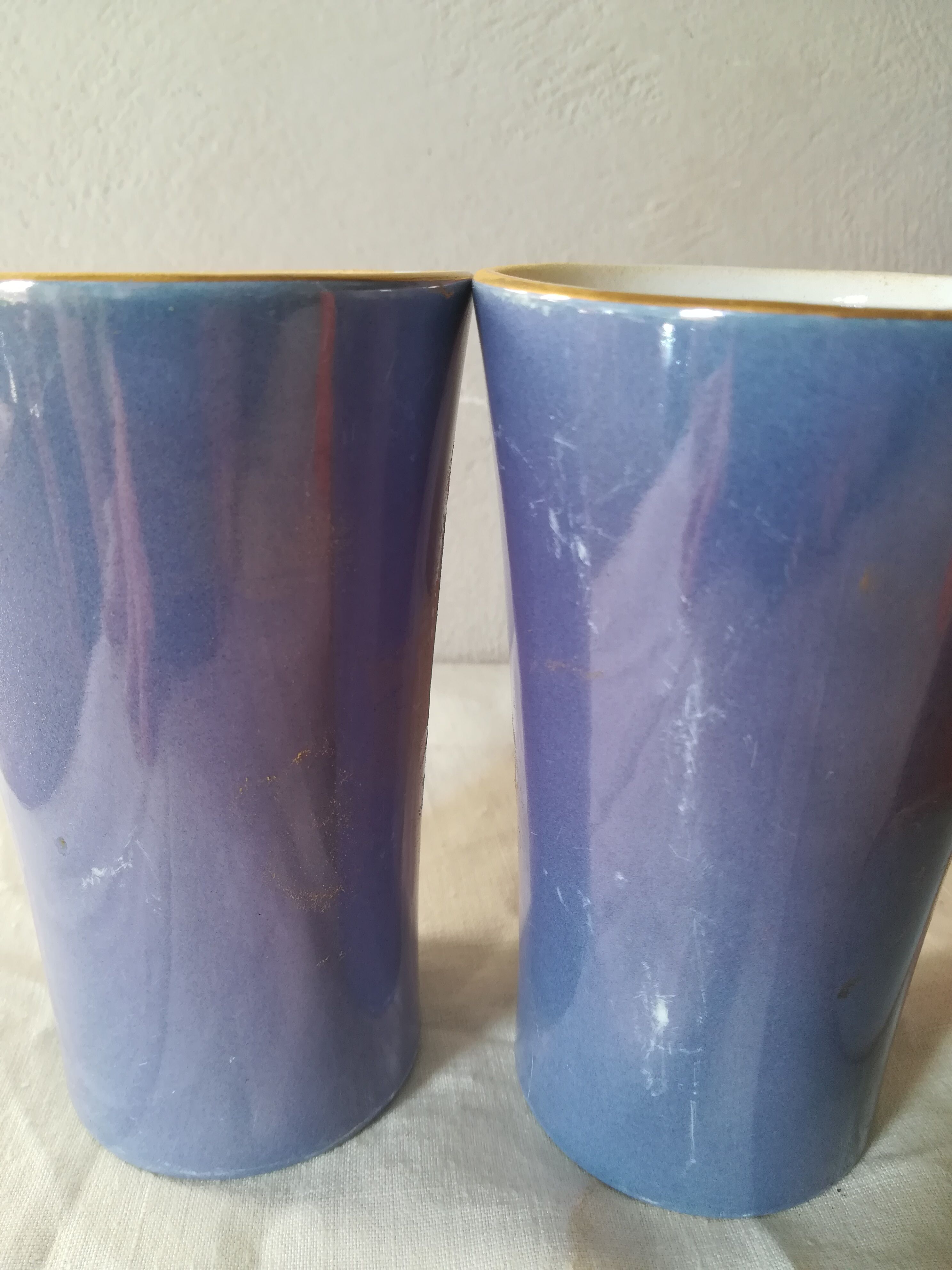 8 coloured cups in earthenware