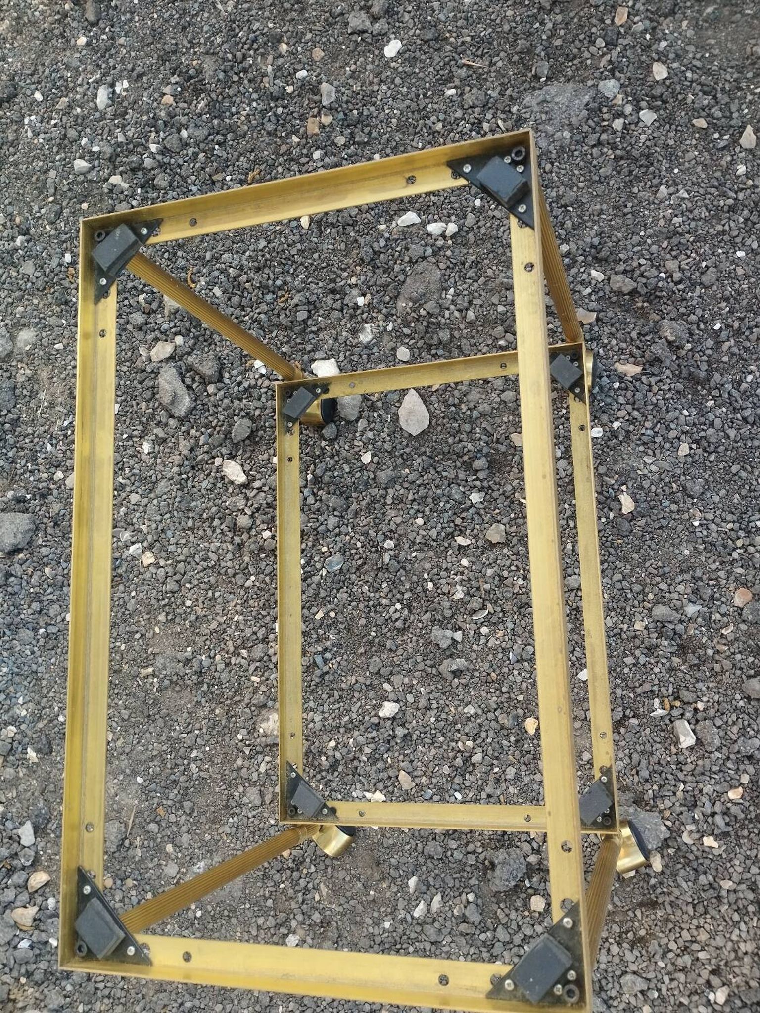 Vintage golden metal rolling dessert trolley