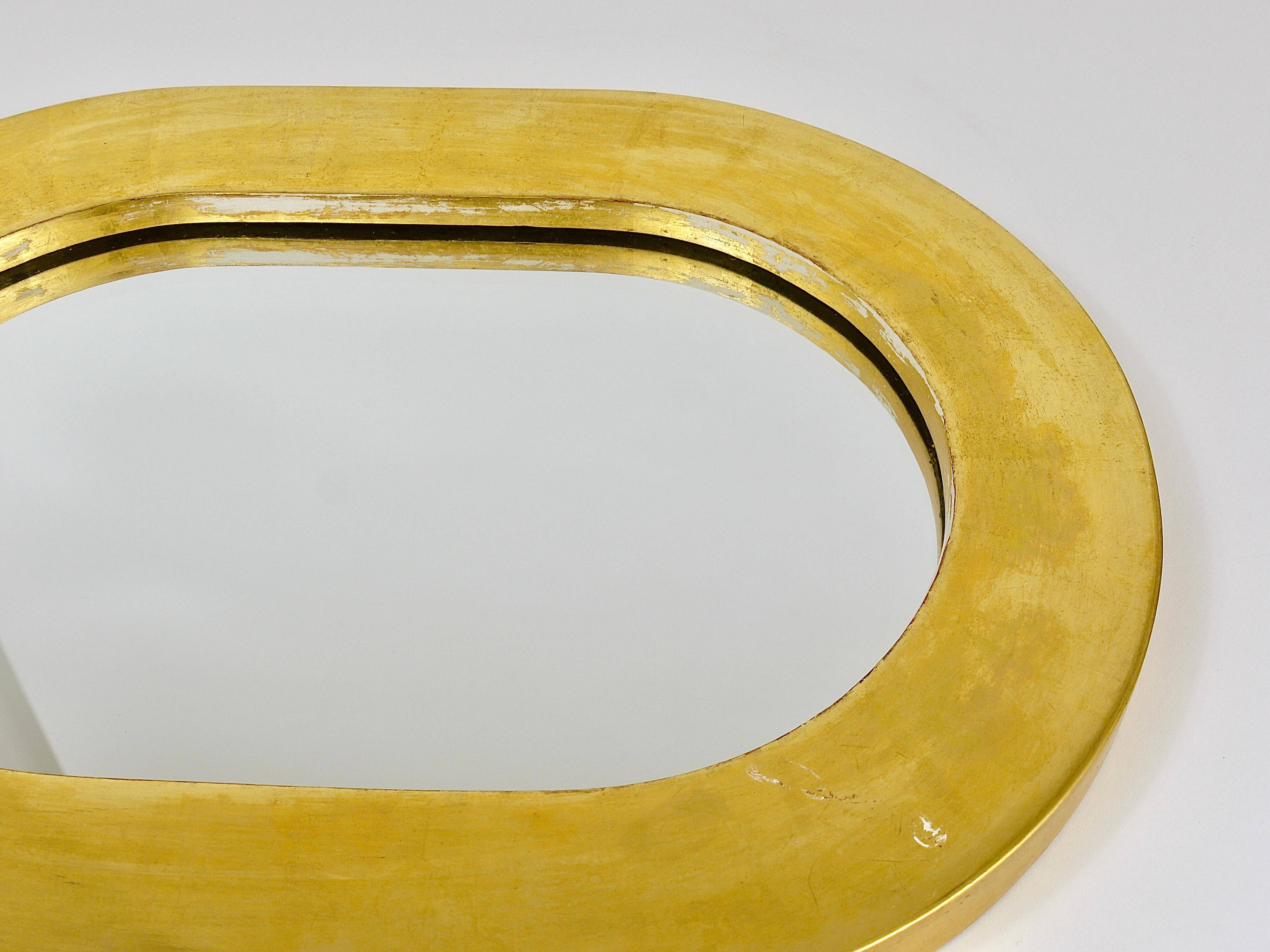 Miroir mural moderne autrichien plaqué or Carl Aubock, 1960s