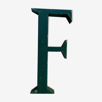 Old sign letter "F"