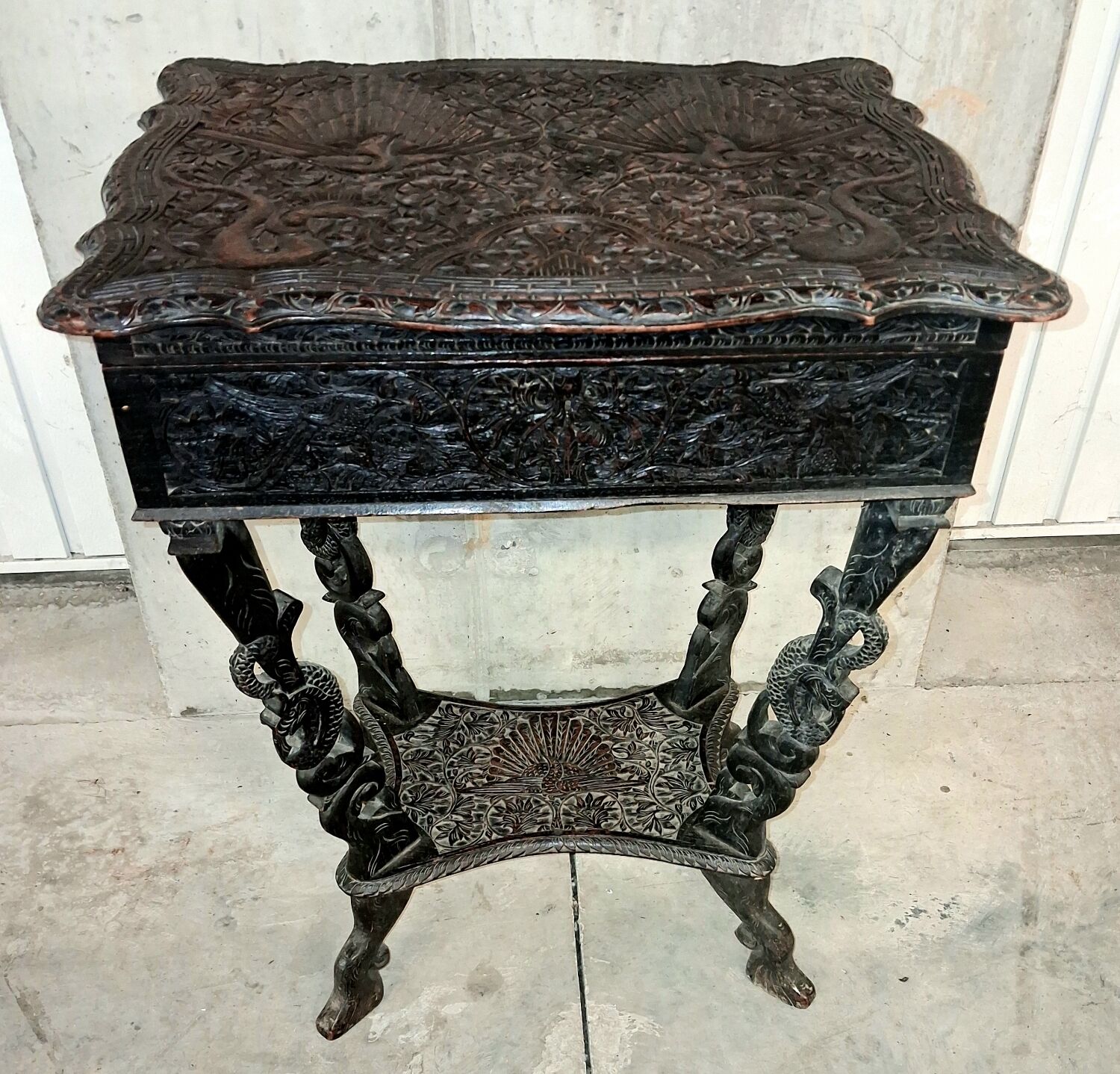 Ethnic carved wooden worker's furniture