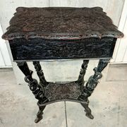 Ethnic carved wooden worker's furniture