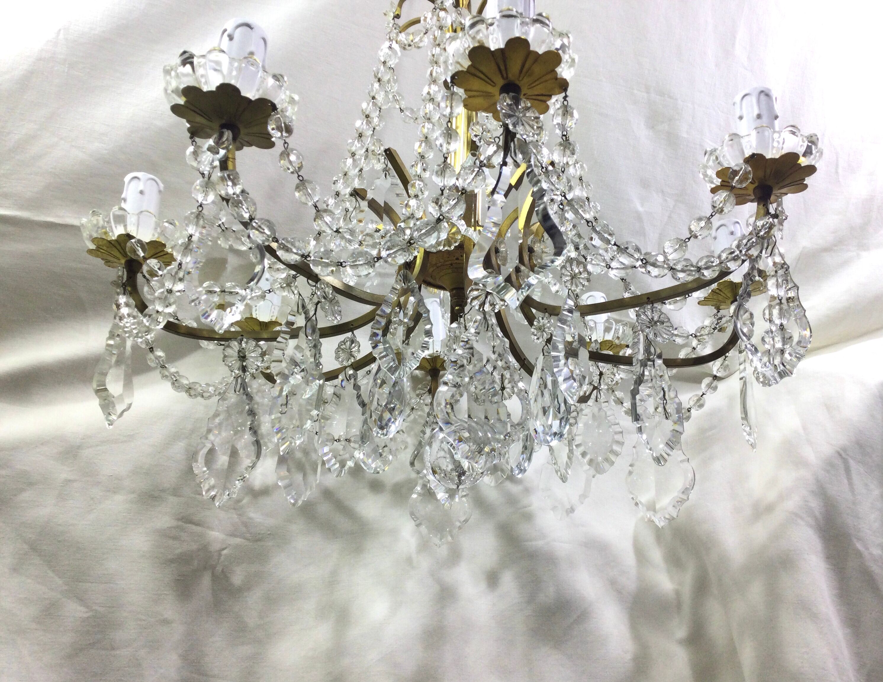 Lustre à 8 lumières en bronze et cristal