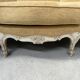 Louis XV style three-seater wingback sofa in patinated beech, 20th century