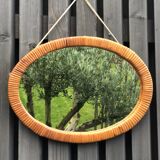 Vintage oval wicker mirror