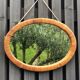 Miroir ovale vintage en osier