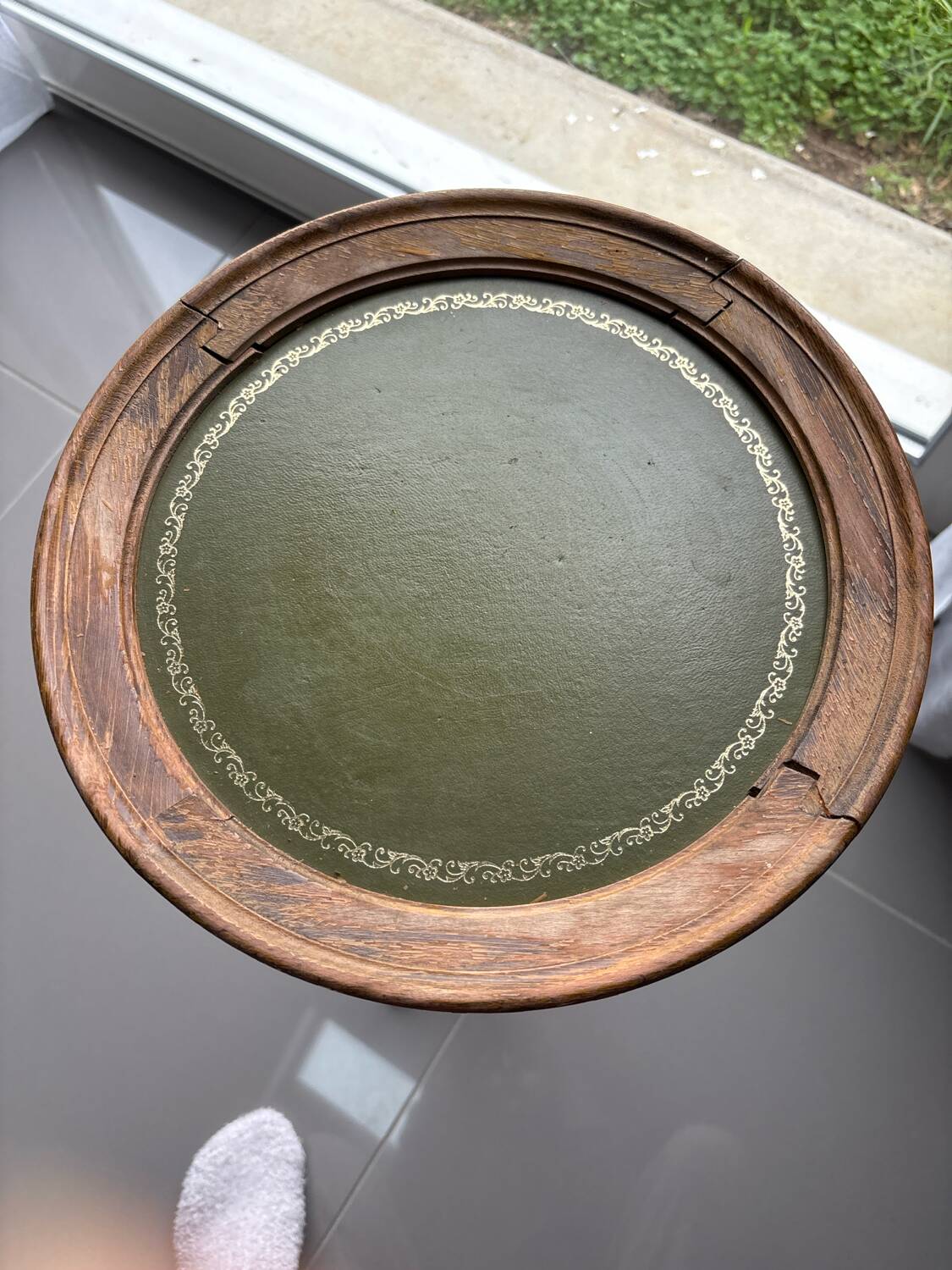 Antique wooden gueridon – green leather top with gold detailing – early 20th century