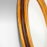 Miroir ovale italien en bois doré du XIXe siècle