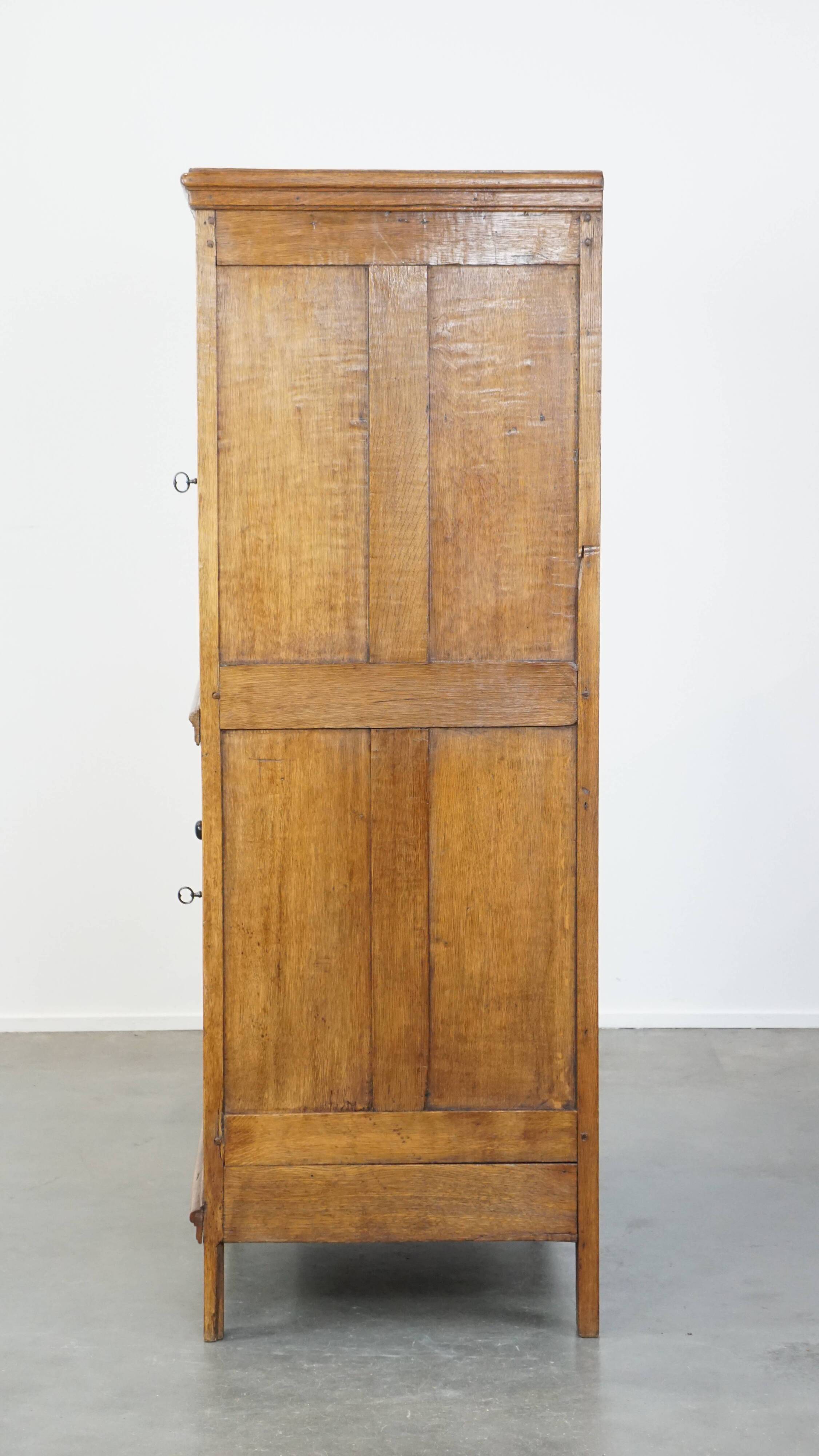 Antique oak bread cabinet from the late 17th century with working locks