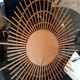 Mirror comet in rattan