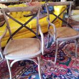 Angled wooden armchairs