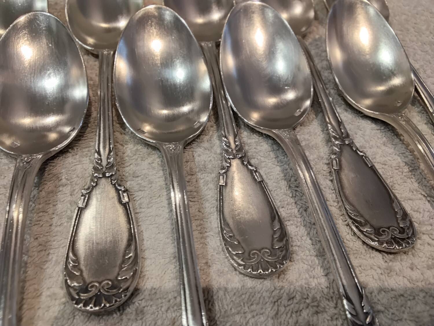 11 silver-plated dessert spoons, OD style, Louis XVI style