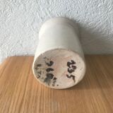 White enamelled sandstone candlestick