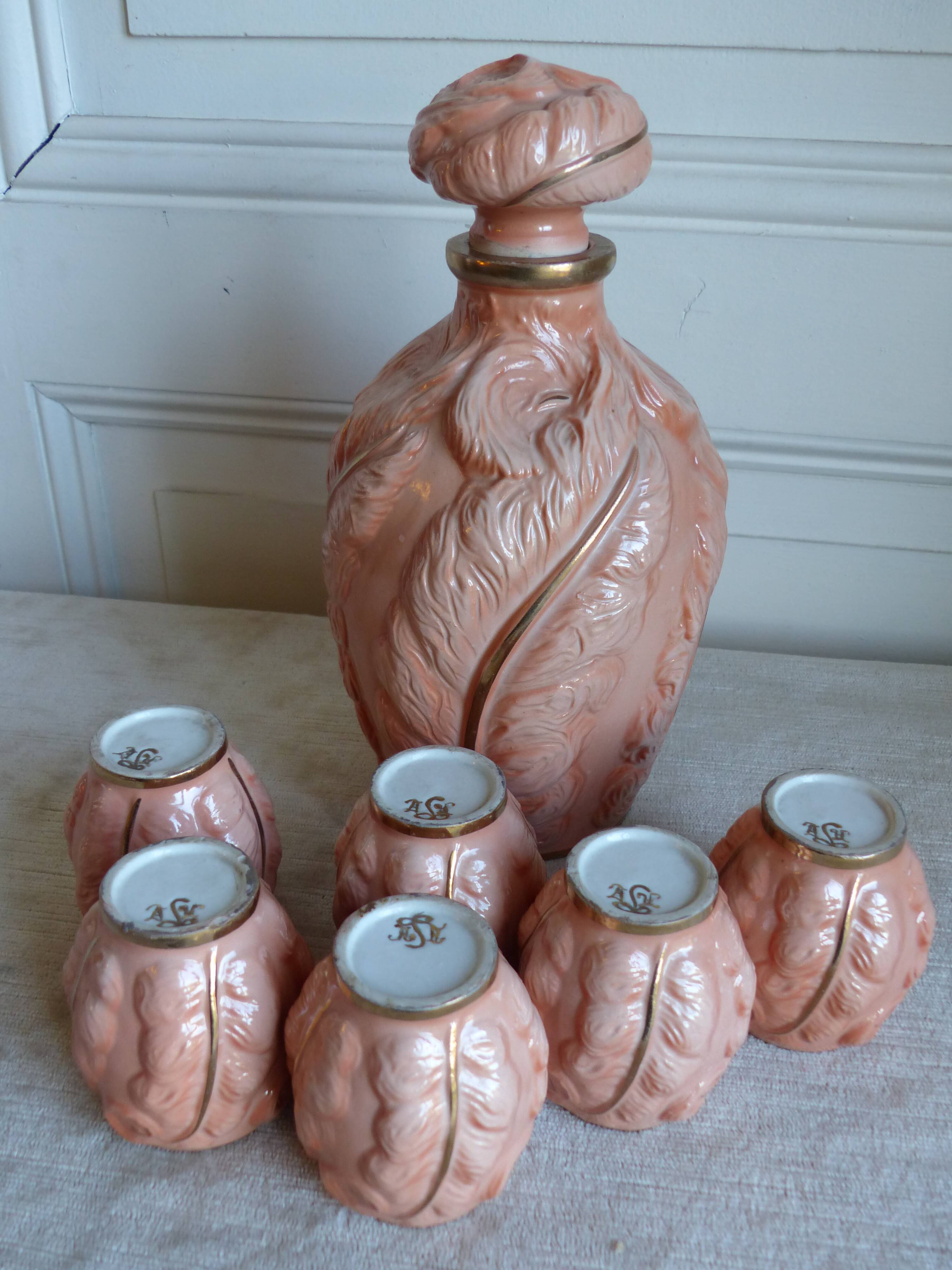 Bottle and six porcelain cups from Couleuvre